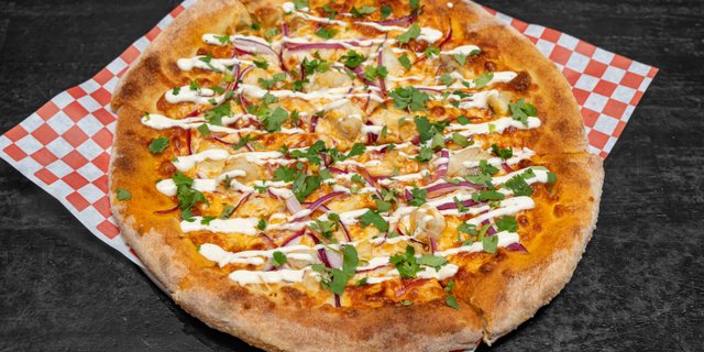 Elephant Kicking Pizza