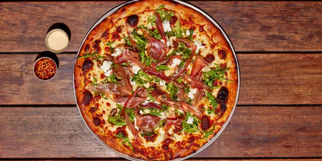 Hand-Stretched Copper Hat Pizza