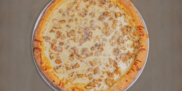 Jerk Chicken Black Truffle Alfredo Pie