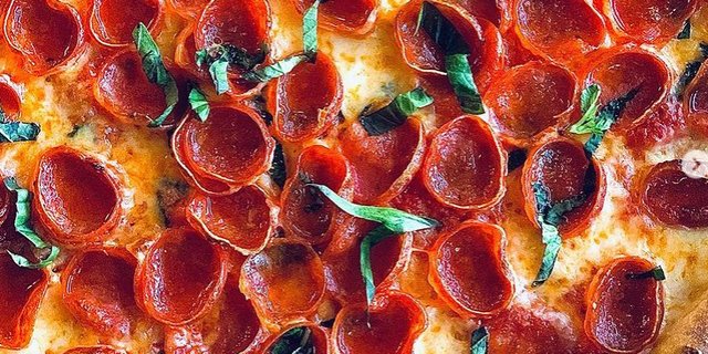 Cupping Pepperoni Pizza