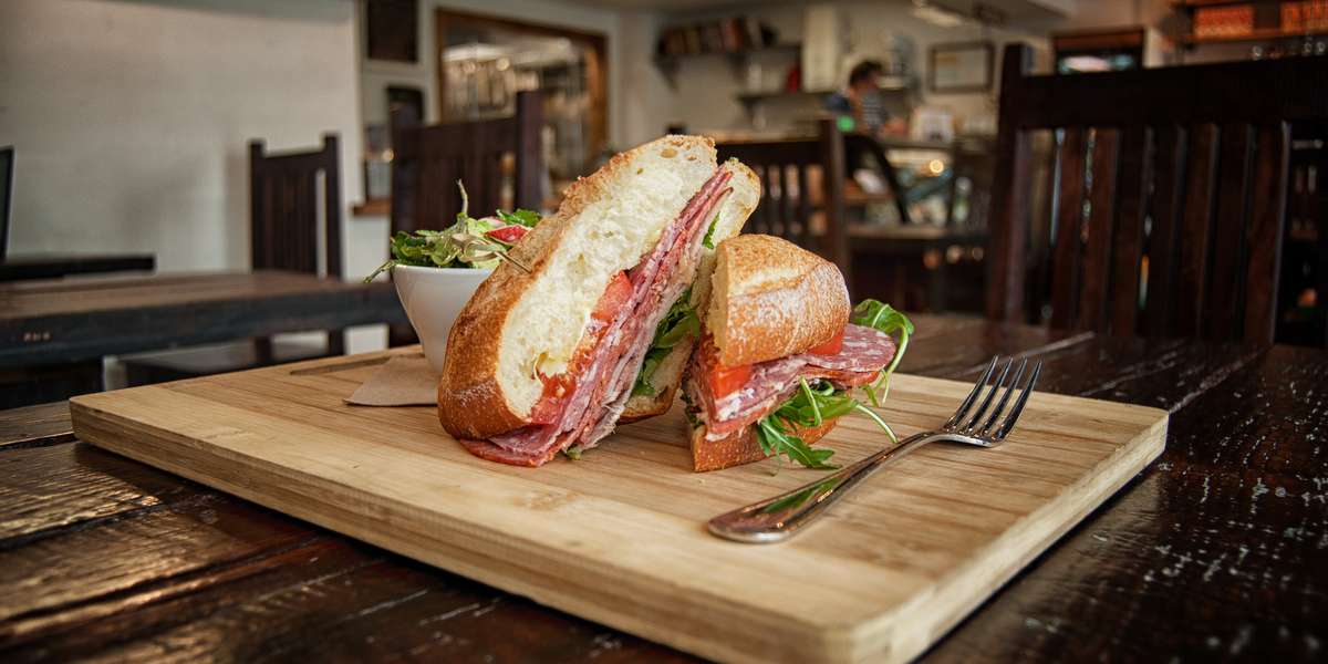 They say once you've had one sandwich, you've had them all. We disagree. Our in-house cured meats are stacked between slices of fresh bread with innovative ingredients for sandwiches unlike any other. Wether you take a trip to Philly with our Hoagie Sandwich or hop a plane to Vietnam with our Banh Mi, you're sure to find something delectable. - Il Porcellino Salumi