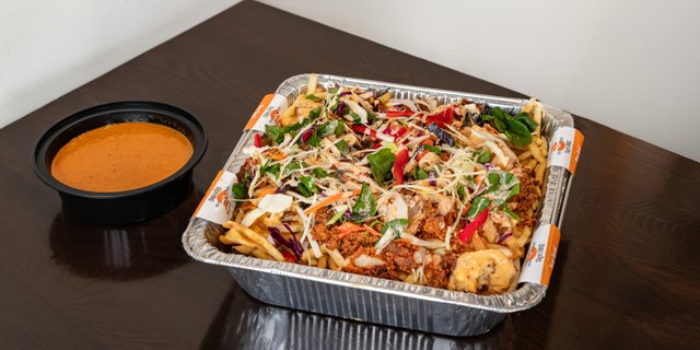 Loaded Masala Fries w/ Fried Butter Chicken