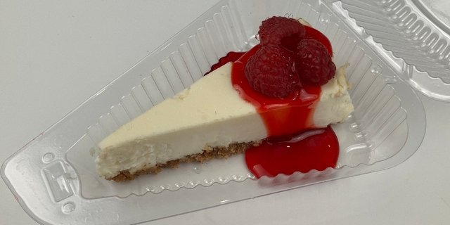Cheesecake w/ Raspberry Topping