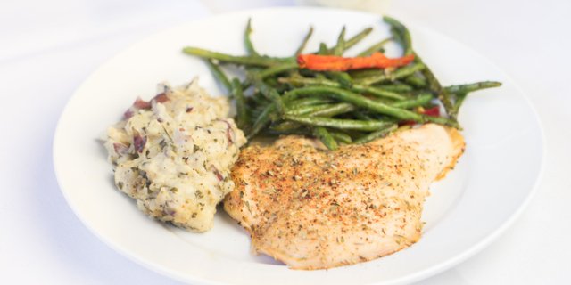 Herb Roasted Chicken Breast w/ White Wine Sauce