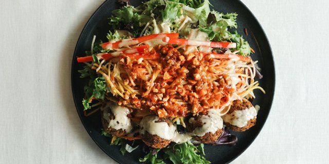 Quinoa Burger On Arugula w/ Almond Crunch