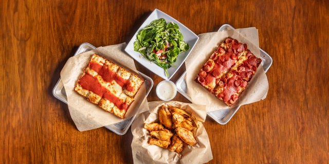 2 Pizzas, Wings & Salad Package