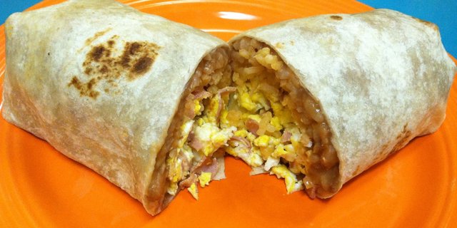 Eggs w/ Chorizo, Potatoes, Rice & Beans Burrito