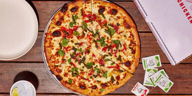 Hand-Stretched Artichoke Pesto Pizza
