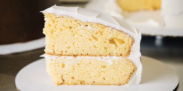 Double Layer Southern Butter Cake Slice w/ Cream Cheese Frosting