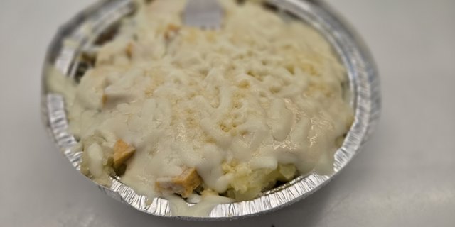 Chicken Alfredo Loaded Baked Potato