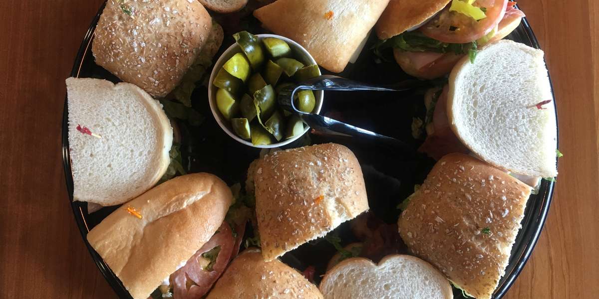 We aim to satisfy your taste buds with our top-notch breakfasts, sandwiches, salads. Our boxed lunches and platters are the perfect way to feed your next event a delicious, wholesome meal. Don't hesitate to order with us!  - Knickerbockers Deli
