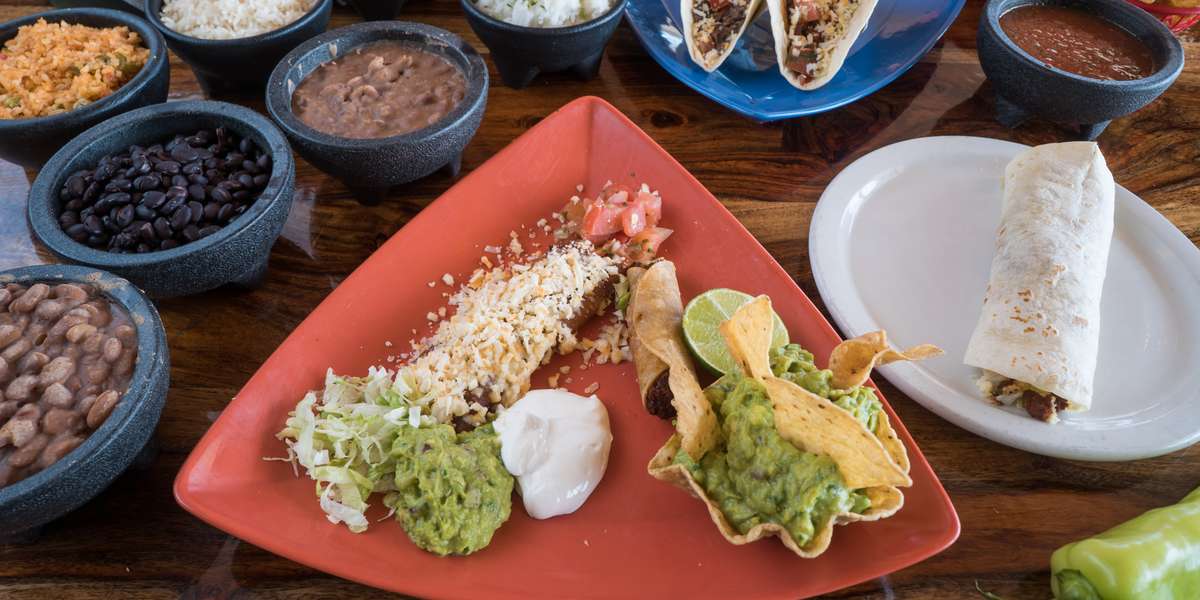 We're Cleveland's first Mexican restaurant, and we've been serving our tacos, burritos, enchiladas and more since 1952. We import authentic ingredients, hand-pick local produce, and prepare nearly everything in our kitchen from scratch. Why? Because it feels right. - La Fiesta