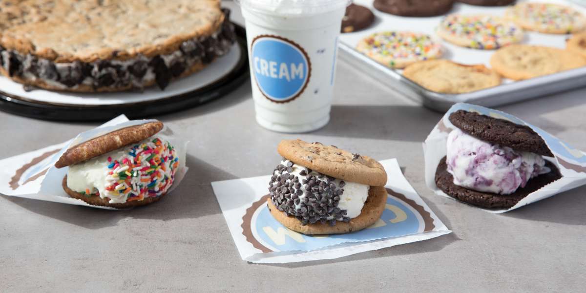 We wanted to serve a throwback to our childhood, so we sandwiched rich ice cream between Mom’s fresh-baked cookies to make one-of-a-kind ice cream sandwiches. We then set out to share those secret creations with all of humanity. Try out our endless options of cookies, ice cream, and toppings for a real sweet treat you're sure to love. - CREAM