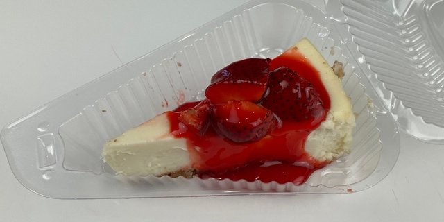 Cheesecake w/ Strawberry Topping