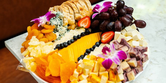 Imported Cheese and Carved Fruit