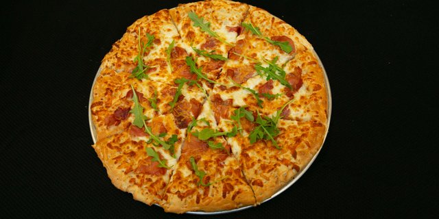 Prosciutto Arugula Pizza