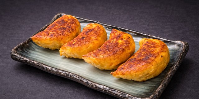 Pan-Fried Roasted Duck Potstickers