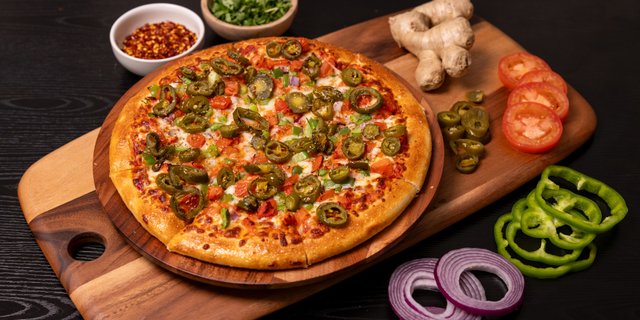 Butter Paneer Masala Veggie Pizza