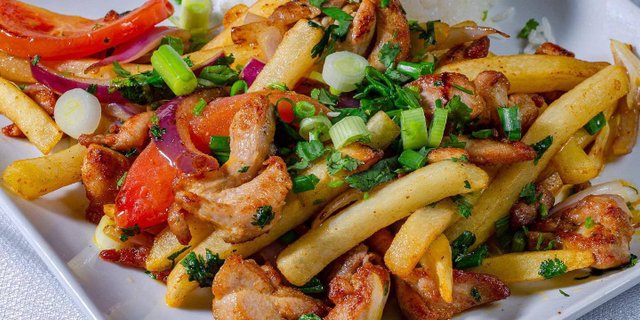 Saltado de Pollo