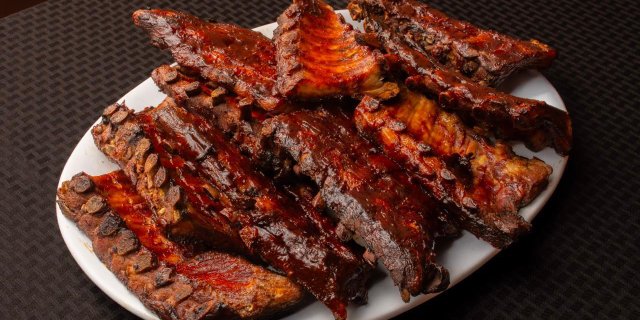 Costillas "Baby Back Ribs" w/ BBQ Sauce