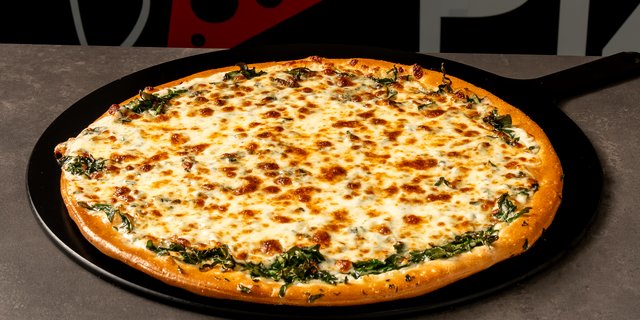 Spinach Alfredo Pizza