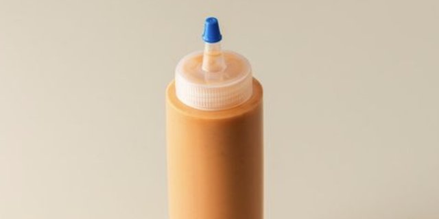 Doma Secret Hot Sauce Bottle