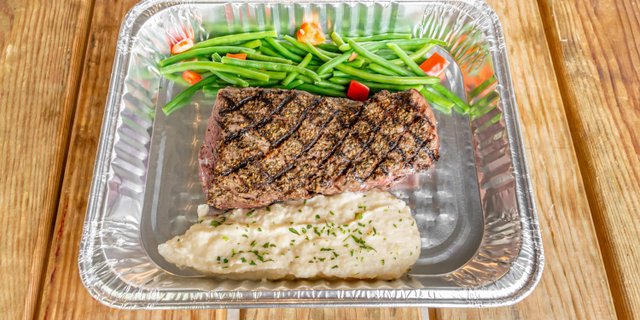 Herb Crusted Beef Tenderloin w/ Peppercorn Demi-Glace