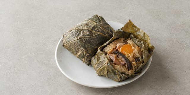 Sticky Rice w/ Pork in Lotus Leaf