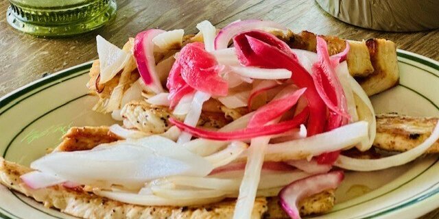 Mojo Grilled Chicken Breast Sliced And Top With Grilled Onions