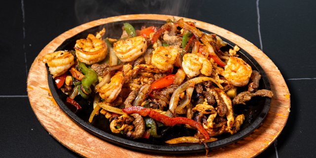 Steak, Chicken, & Shrimp Fajitas