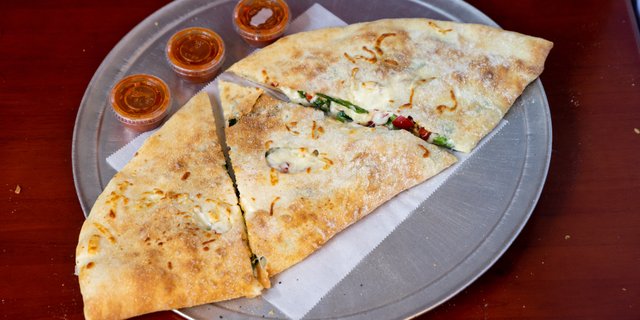 Grilled Chicken, Spinach & Peppers Calzone