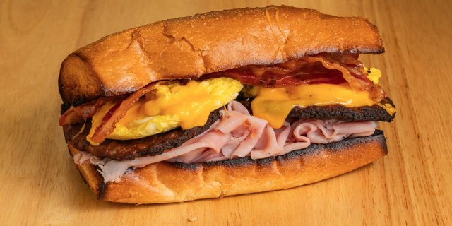 Bacon, Ham, Sausage, Egg & Cheese Sandwich