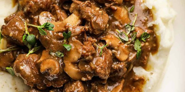 Beef Tips w/ Sautéed Mushroom Demi
