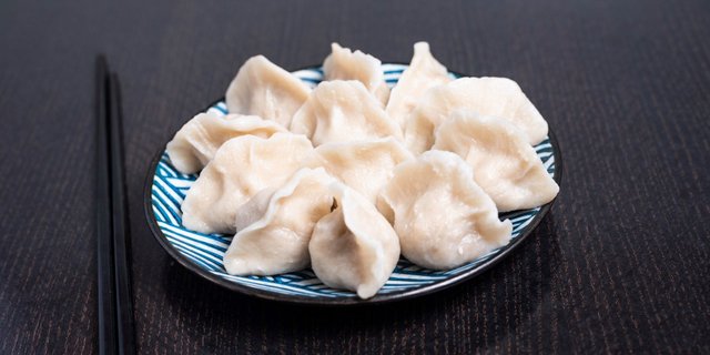 Pork Dumplings w/ Napa Cabbage