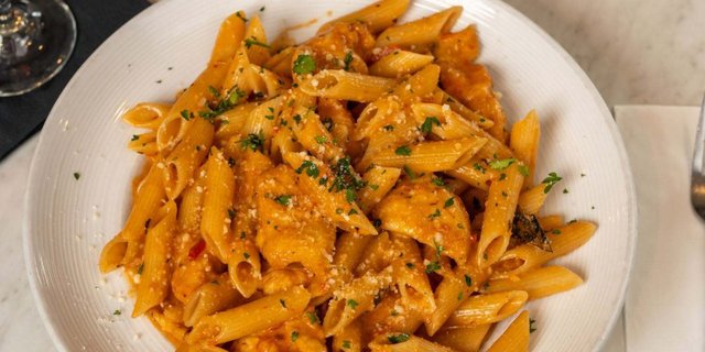 Penne Vodka Topped w/ Chicken Cutlets