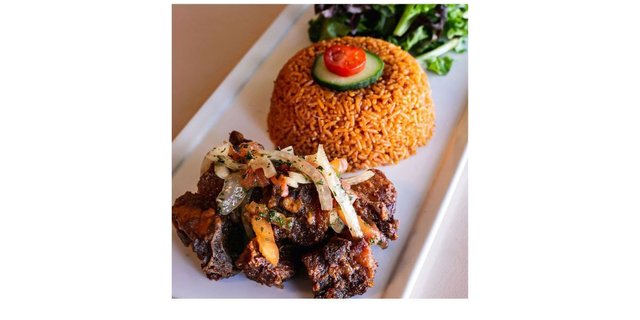 Jollof Rice W/ Turkey Tail