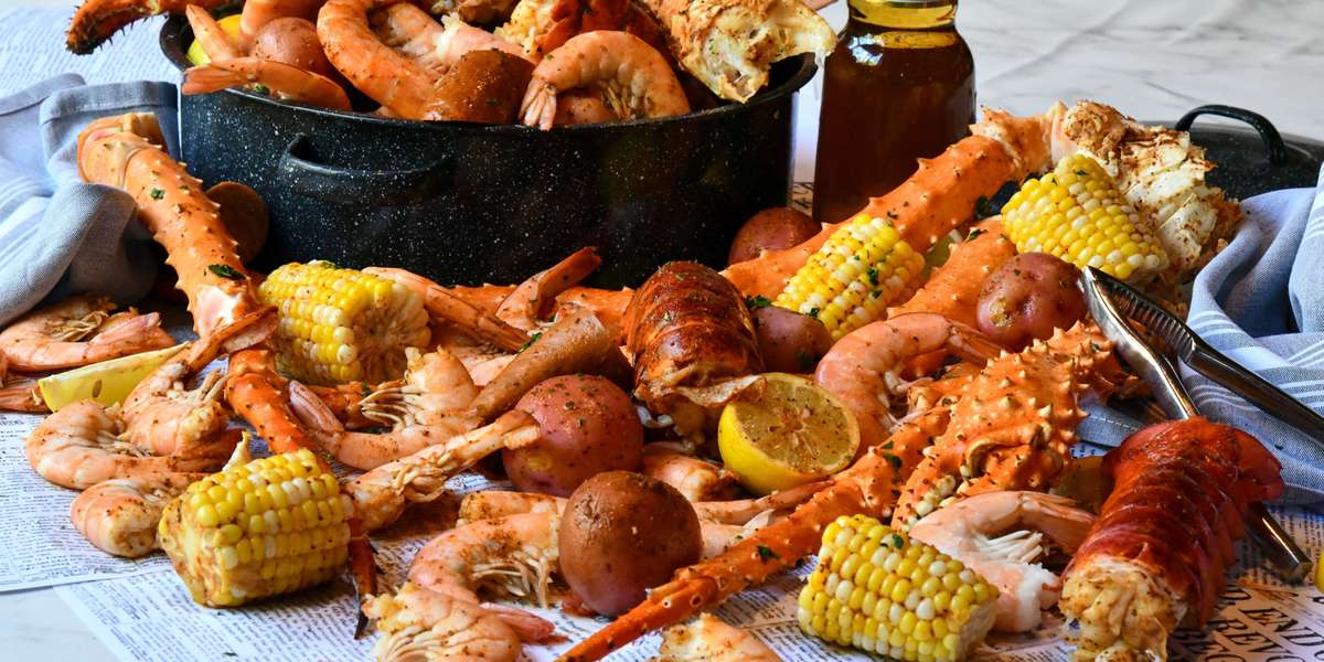 Let us cater your home or office party. Party Platters ~ Box Lunches ~ Group Meals ~ Seafood Boil Packs ~ Whole Desserts and More! We've got you covered. - River Crab