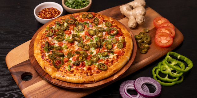 Butter Paneer Masala Pizza