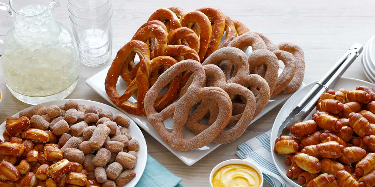 It all started back in 1988 at a farmer's market in Downingtown, PA. Anne Beiler and her husband sold a variety of snacks, including hand-rolled, soft pretzels. Today, Auntie Anne’s rolls more than 500,000 pretzels every two days, which is enough to feed a pretzel to every person living in Lancaster County, PA (home to Auntie Anne’s, Inc.). - Auntie Anne's Pretzels