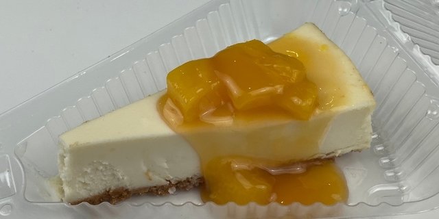 Cheesecake w/ Mango Topping