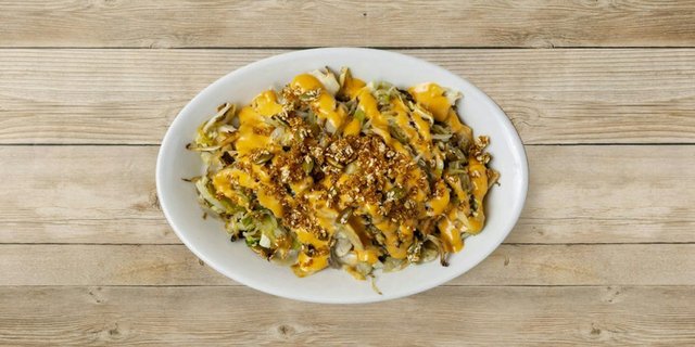 Seasonal Shredded Roasted Cabbage With Quinoa Crunch & Spicy Mayo