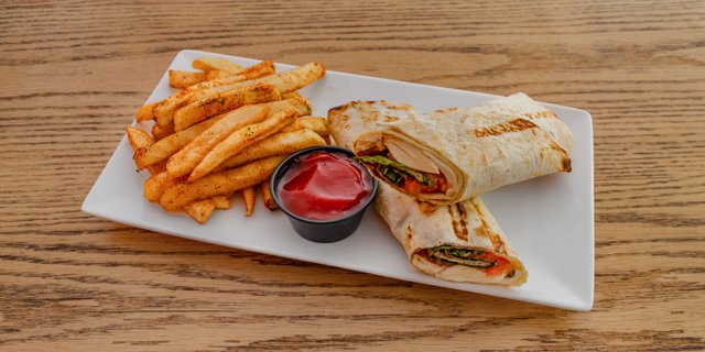 House-Made Mozzarella & Heirloom Tomato Wrap