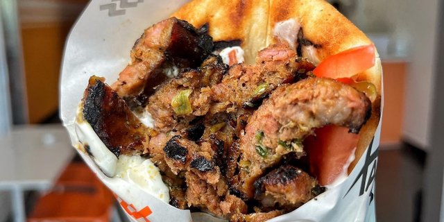 Greek Sausage Pita Sandwich