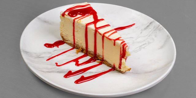 Cheesecake w/ Raspberry Sauce